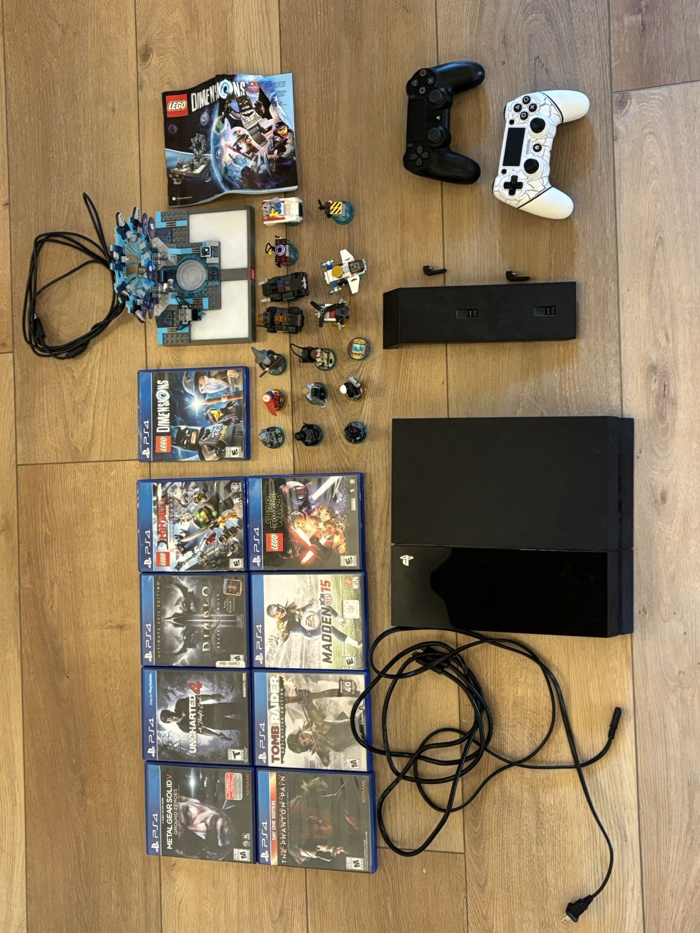 PlayStation 4 with accessories and games.