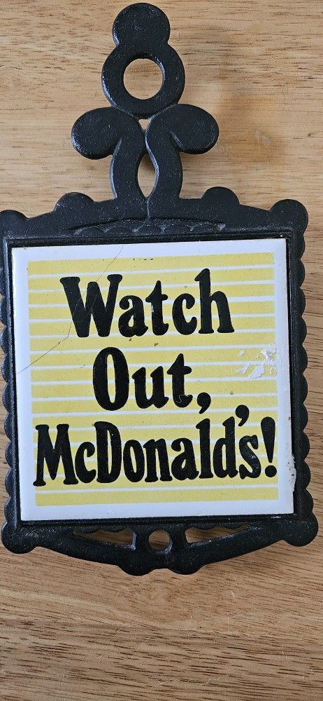 1970s McDonald's Watch Out Sign, 5x7 inches, black and yellow, with a vintage vibe marketing