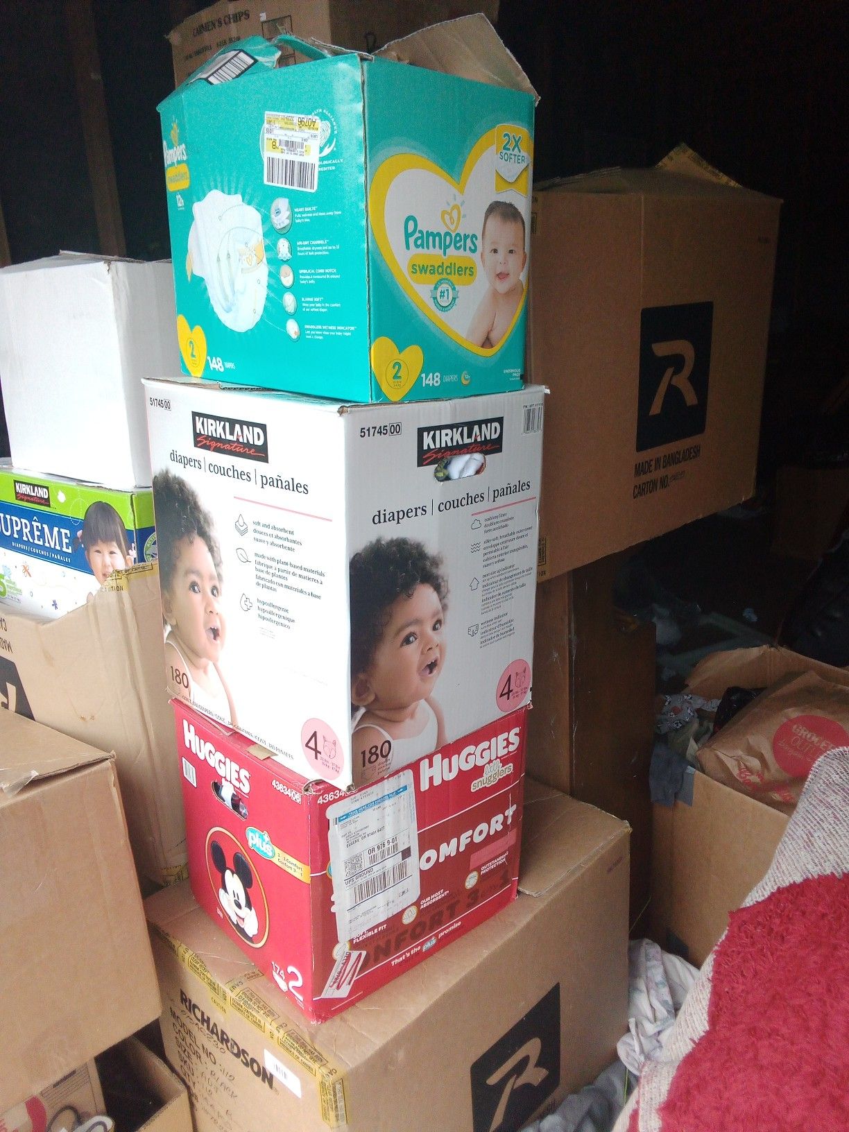 Huge boxes of baby clothes