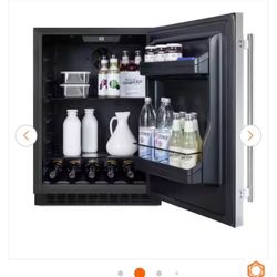 BRAND NEW SEALED AL54 MINI FRIDGE. RETAILS FOR OVER $1000, price is negotiable.