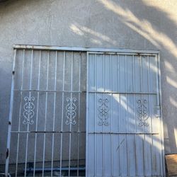 White Metal Protección Door  83”x 97 1/2”