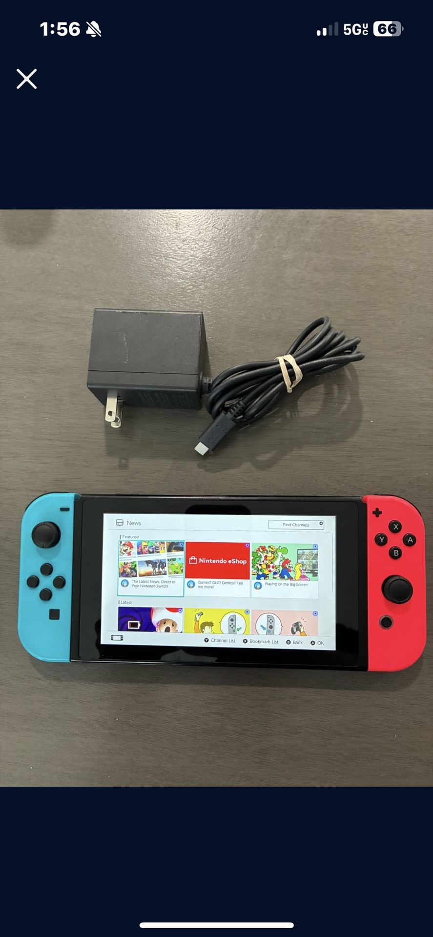 Nintendo Switch System / Console - Red Blue Version - Works Good - Includes Charger. System has some scratches but works good. Only comes with home ch