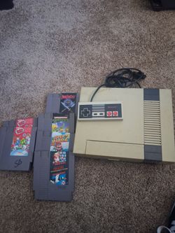 Nintendo with games and contoller