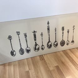 55” long and lightweight spoon print canvas wall art for $11.00. 