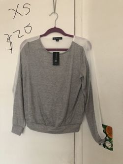 New w/tag size XS light sweater/blouse retail $59 now $19