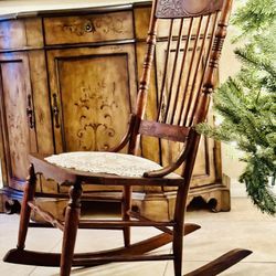 Antique, Parlor or Low Profile Ladies Rocking Chair. It’s solid Mahogany with a Steam-Pressed Pattern on the back indicative of the 1800’s