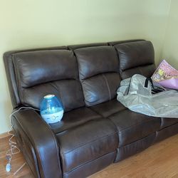 Three person leather sofa plus side table