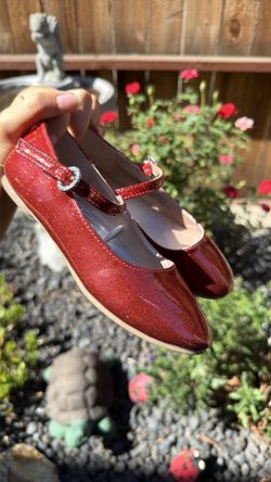 Shiny red girl shoes