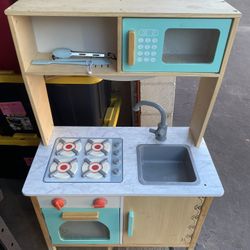 B. toys – Mini Chef Kitchenette – Pretend Play Wooden Kitchen 