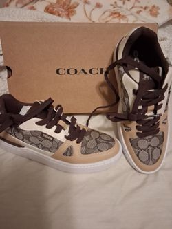 New woman  Coach tennis shoes
