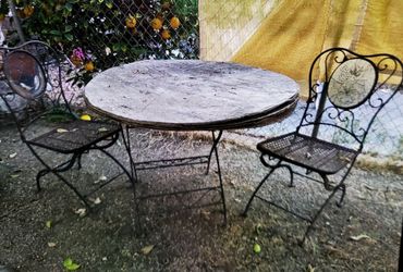 Set of two iron chairs and table