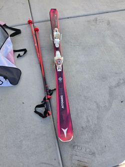 Womens arctic skis with poles and bag