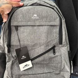 Travel backpack with laptop sleeve.
