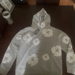 Denim Tears Grey African Diaspora Goods hoodie with white accents #hoodie #DenimTears