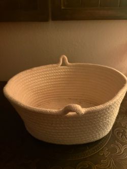 decorative, off-white or beige woven cotton rope storage basket