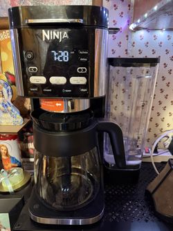 Ninja Coffee Maker With Pod Organizer Included.