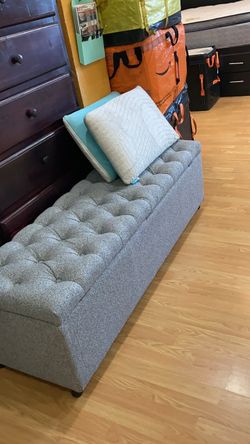 Gray storage ottoman