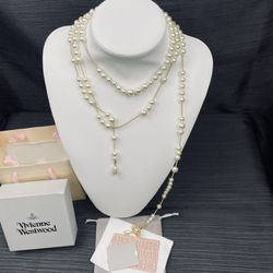 Brand new irregular pearl necklace with golden yellow pendant