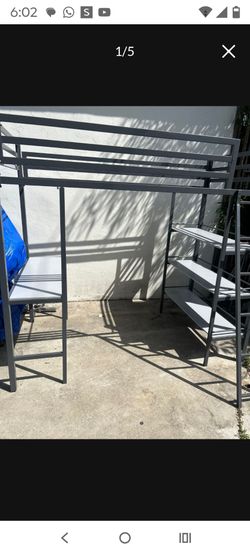 Metal loft twin bed with shelves