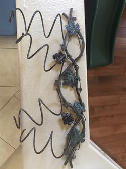 Wrought iron wine holder