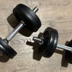 Set Of Cast Iron Adjustable Dumbbells 25 lbs Each.