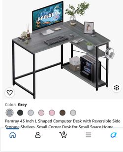 Grey computer desk