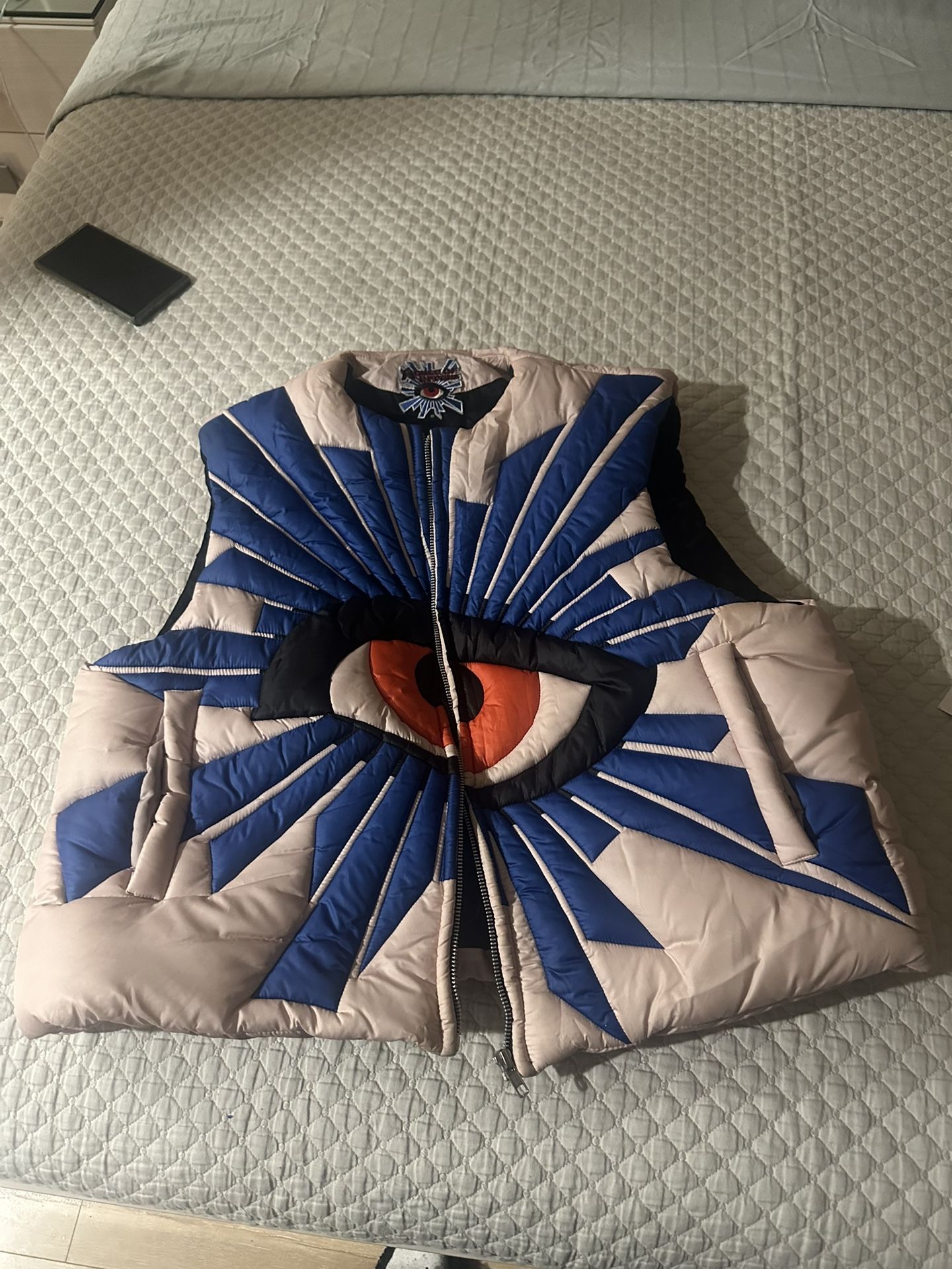All seeing eye puffer vest size medium