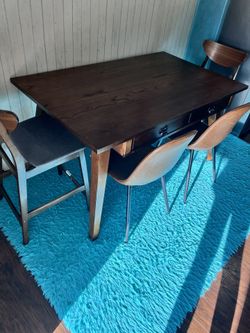 Selling Table With 4 Chairs. Very Good Condition.