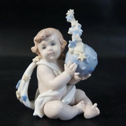 Lladro Figurine A NEW BEGINNING BABY CHILD & WORLD STARS #6831