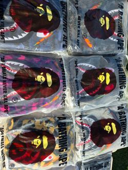 DENIM TEARS BAPE AND SWEATERS.