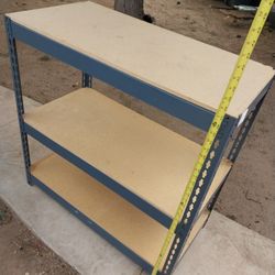 STORAGE RACK 36" Hx 18"w X 18" D HAS SMALL CHIPED IN CORNER BUT SITS GOOD ALL THE WAY AROUND