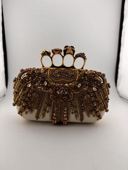 McQueen Skull Four-Ring Spike Crystal Clutch Bag