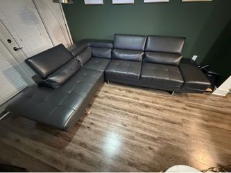 Modern Leather Sectional Sofa – $400