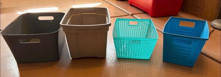4- plastic buckets/ totes