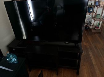 Two TVs  and Stand