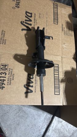 Front suspension strut assembly