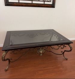 Large Heavy Table Distressed Dark Wood And Glass With Ornate Metal Design 