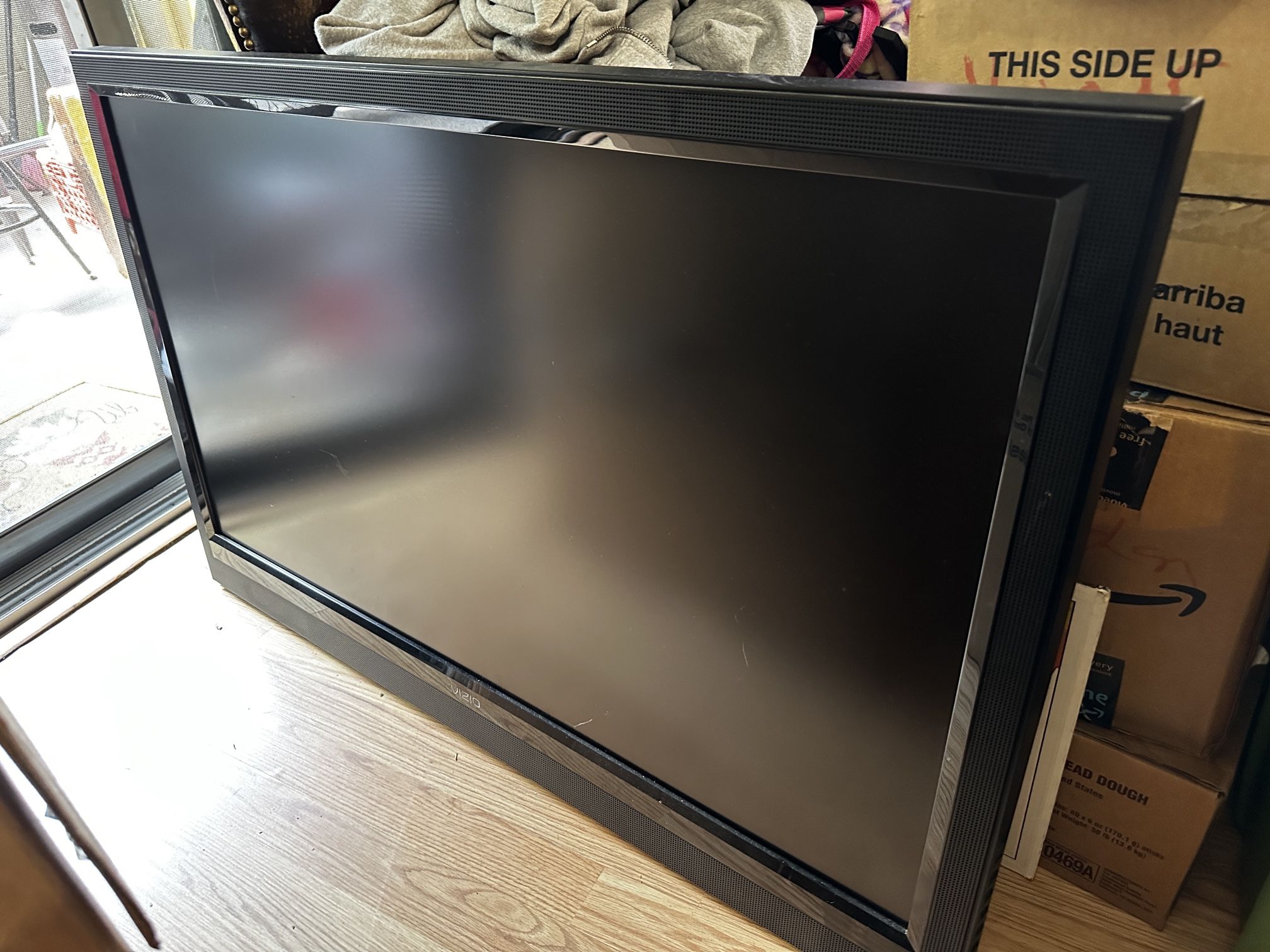 2 TVs - 42” VIZIO & 32” PIXEL with remotes and wall mounts