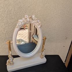 Gold and white rose mirror. 10x9