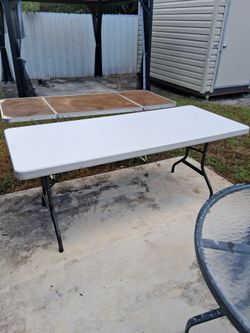 2 - 6ft tables. 1 is fake wood folding table.  The 2nd is LIFETIME  Resin table in Excellent condition 72x30.  Both for 1 price.