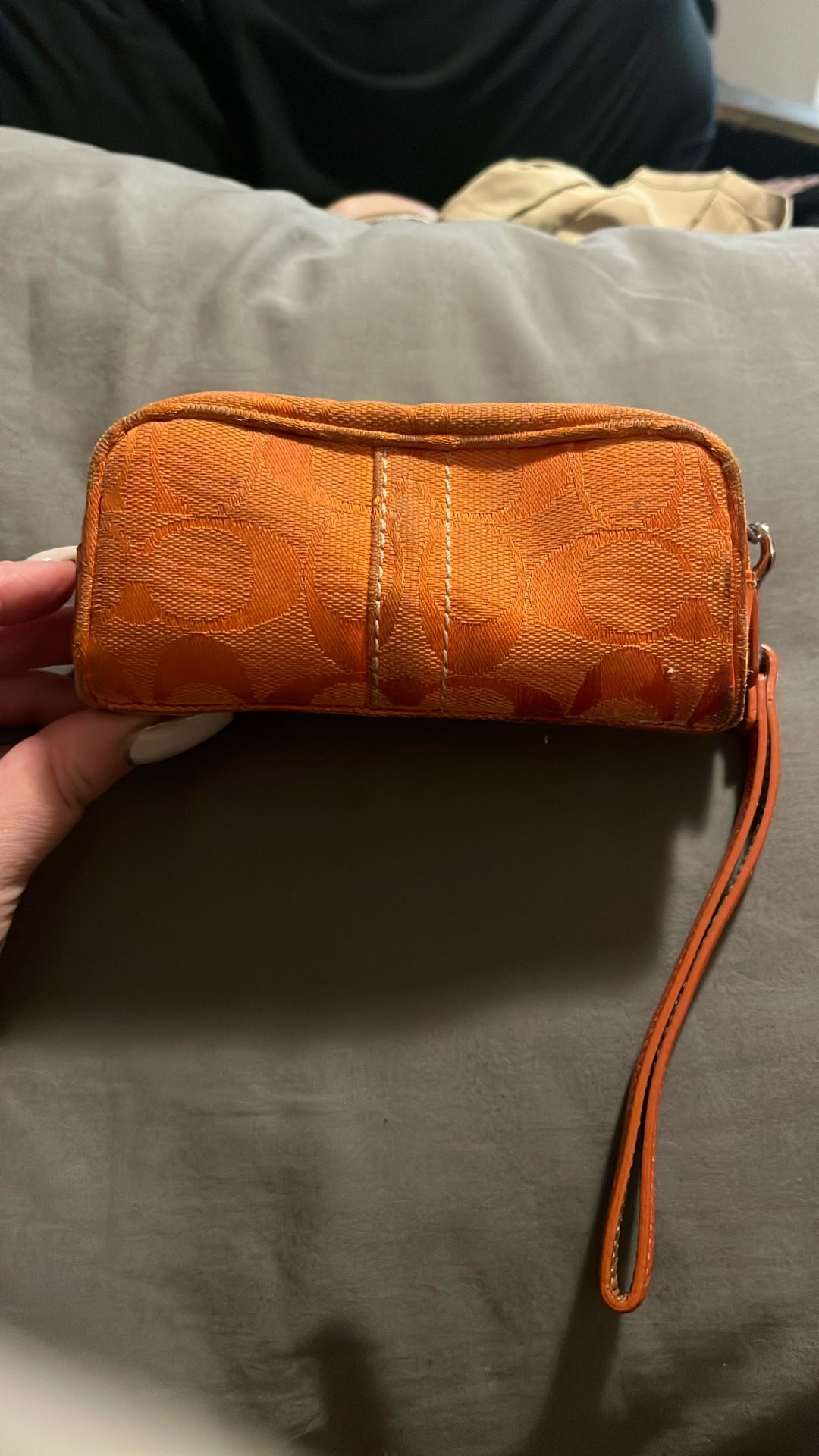Coach orange wristlet