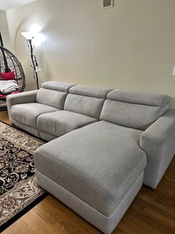 Used sofa with one power recliner