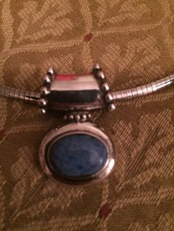 Silver necklace and turquoise pendant