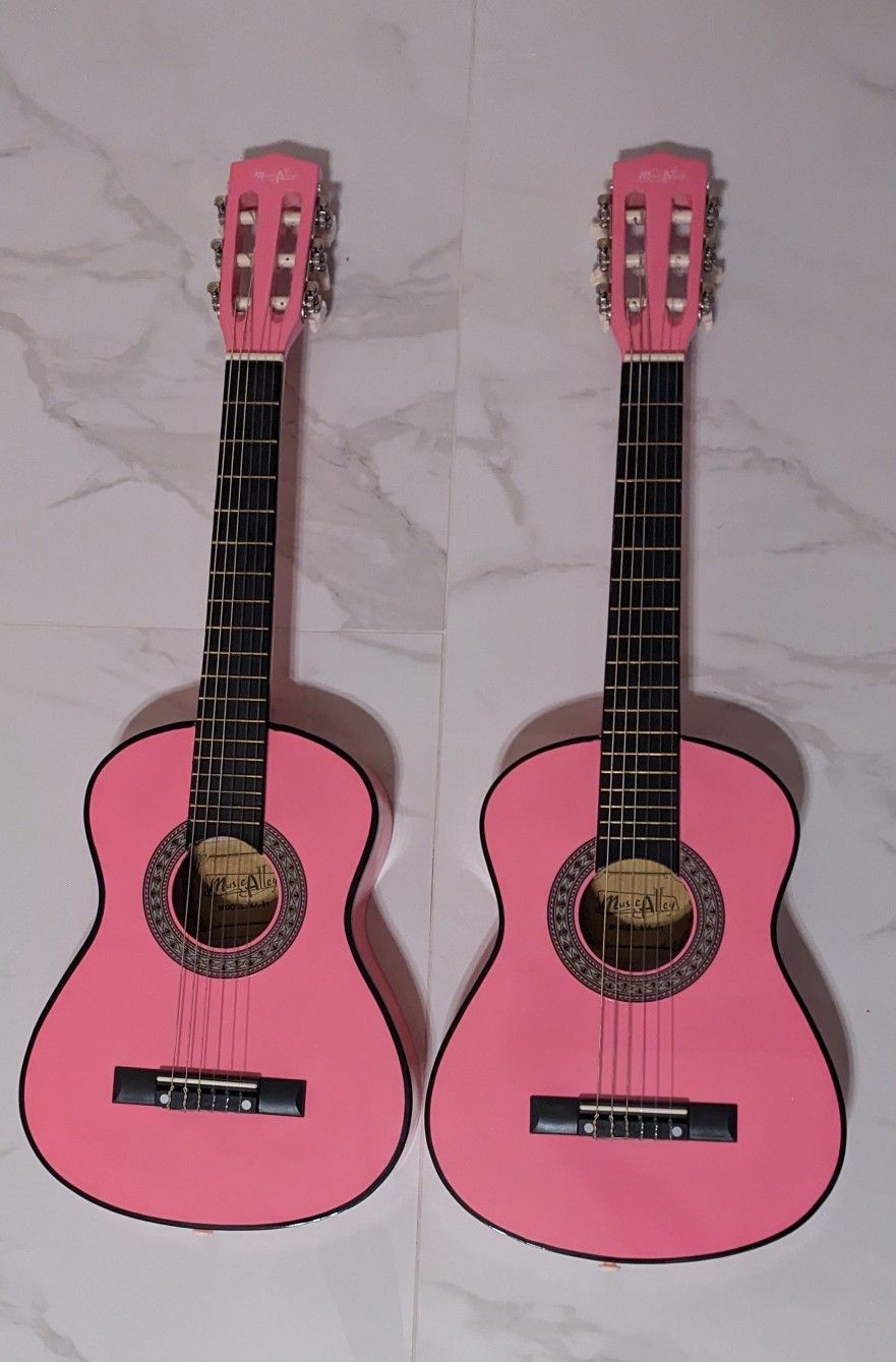2 New Pink Guitars
