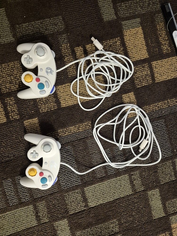 White Super Smash Bros GameCube Controllers