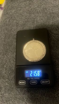 999 % silver Morgan with Bezzel