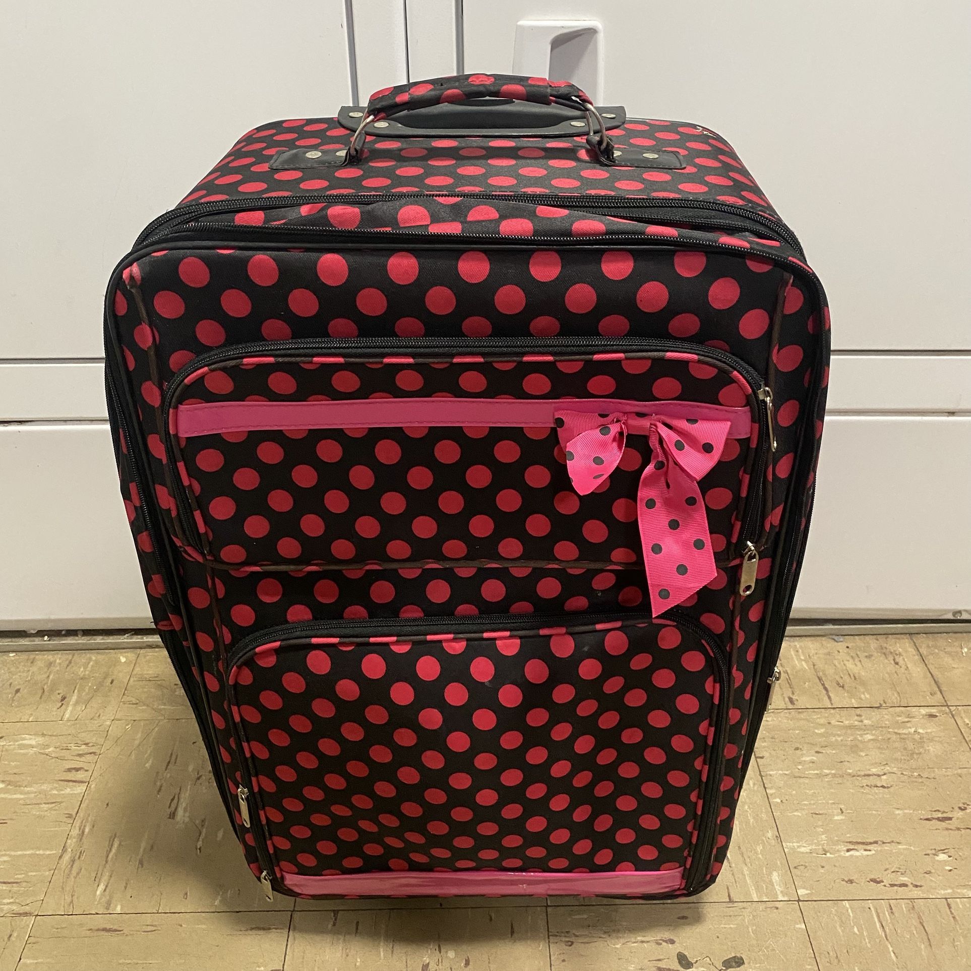 Black with Hot Neon Pink Polka Dot Luggage Checked Rolling Luggage with 2 Wheels Great pre-owned condition. Measurements: 25” Tall x 16” Wide x 12