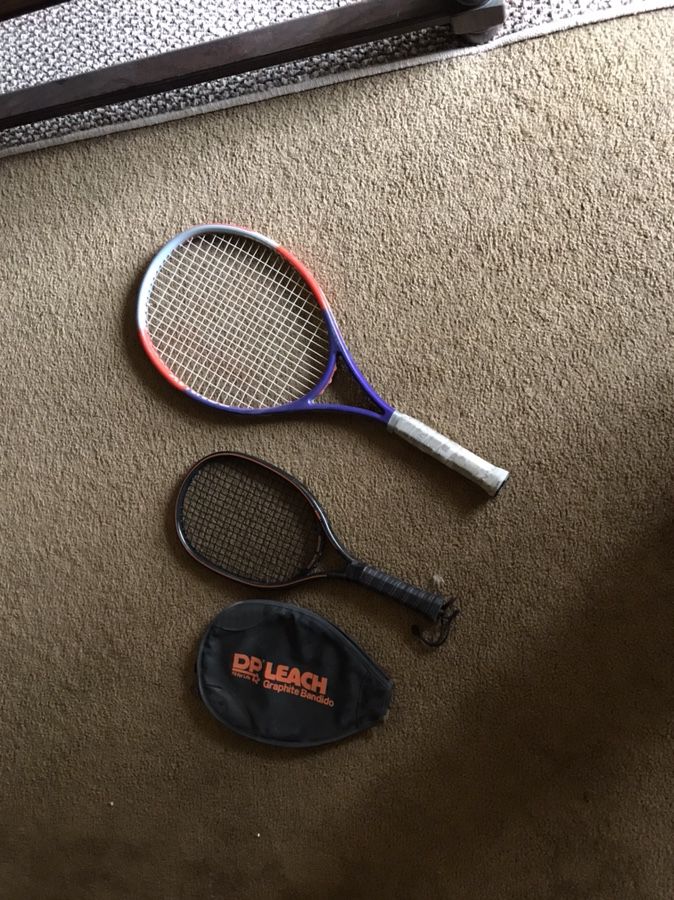 Tennis racket and racquetball racket