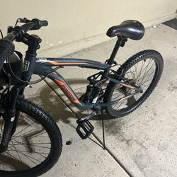 Mongoose mountain bike! orange and black also barley used