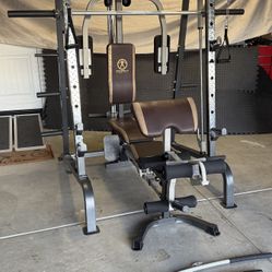 COMPLETE HOME GYM All In One Squat/bench Rack With Built In Chest Fly, Cables, And Smith Machine. Adjustable Bench Included
